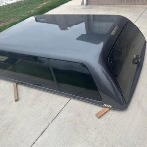 ARE camper shell off 2016-2023 Toyota Tacoma. 6' bed