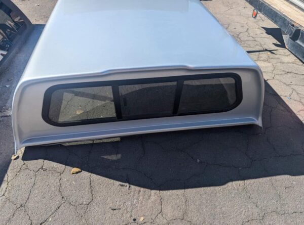 Used 05-22 Nissan Frontier crew cab short bed  camper shell - Image 4