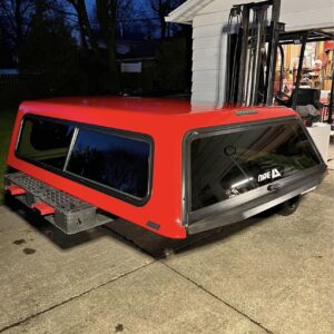 Truck Cap - F150 - Red - 6.5’ Bed A.R.E. red truck cap for a 2022 Ford F150 with a 6.5’ bed