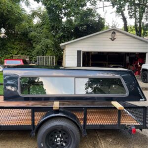 Truck Cap - Dodge Ram - Black ARE black truck cap for a 4th gen Ram 1500 (2009-2024) and 2500/3500 (2010-2024) with an 8ft bed